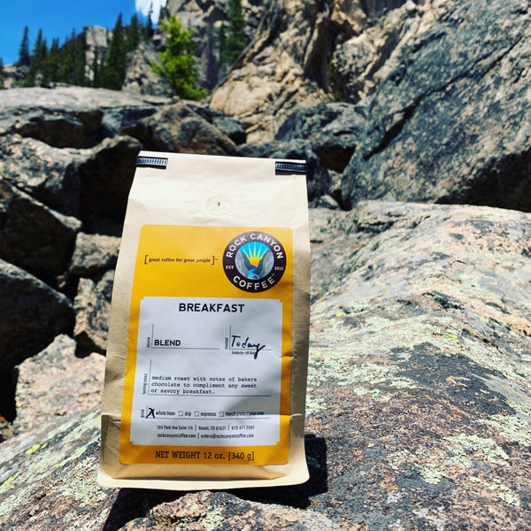 Breakfast blend coffee back sitting on rocks in Colorado mountains near Aspen